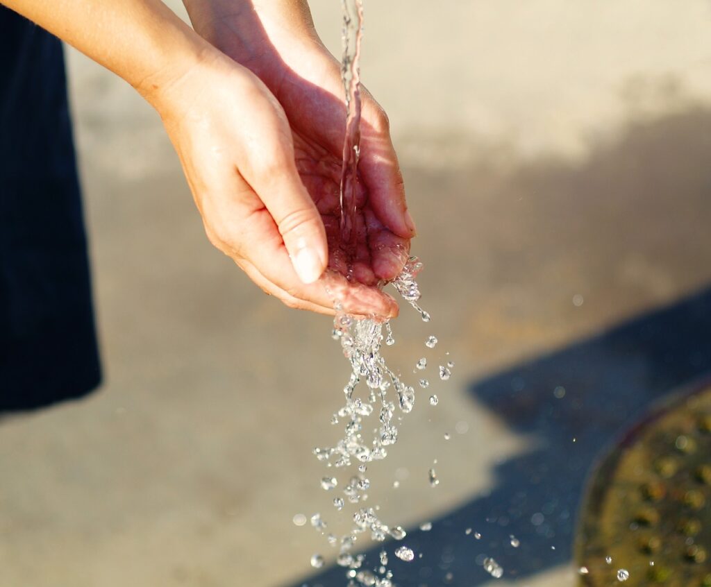 hand, water, hand in hand